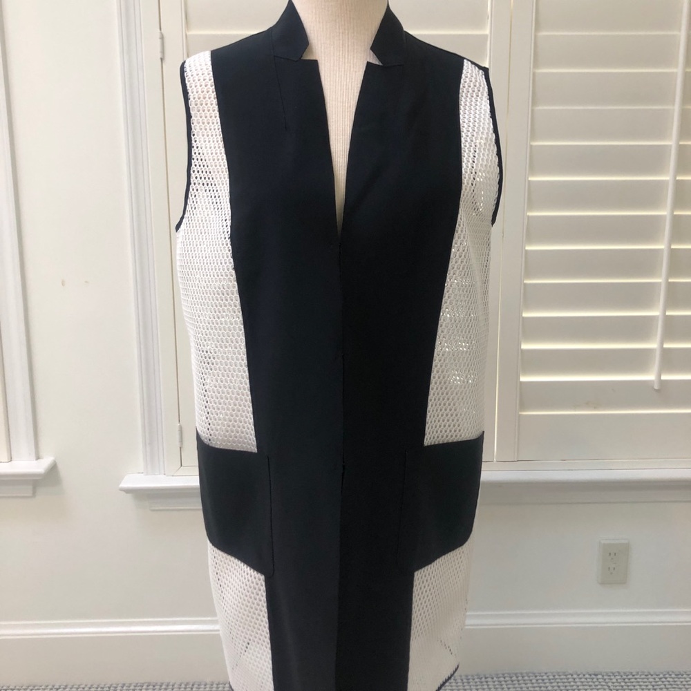 Carlisle/Per Se and white “Akris” style vest.